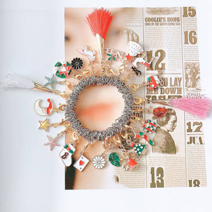 Set de Pulsera y Dijes Navideños niña